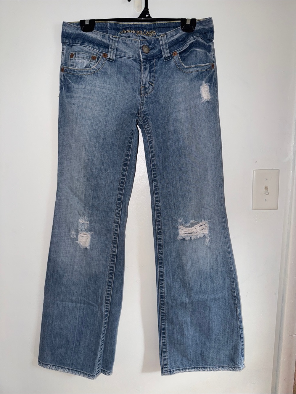 American Eagle Outfitters Light Blue Flare Jeans with Distressed Knees